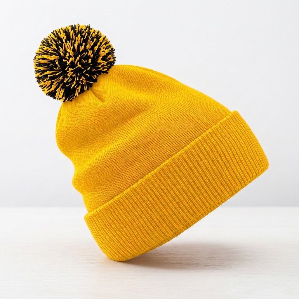 Bonnet jaune à pompon bicolore – Le Soleil